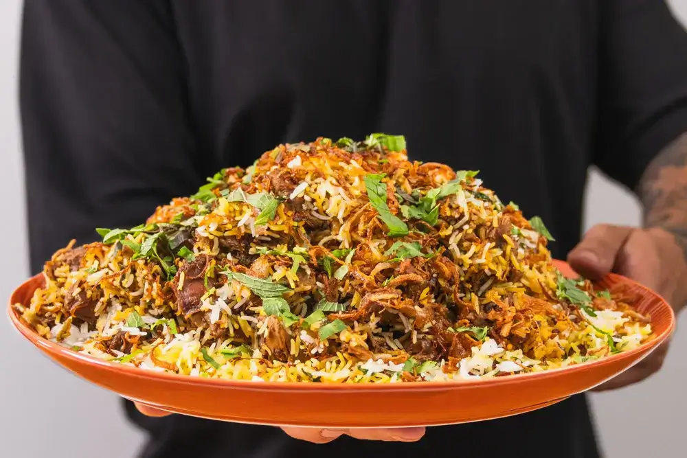 Biryani, a fragrant rice dish with meat and spices, representing our international offerings