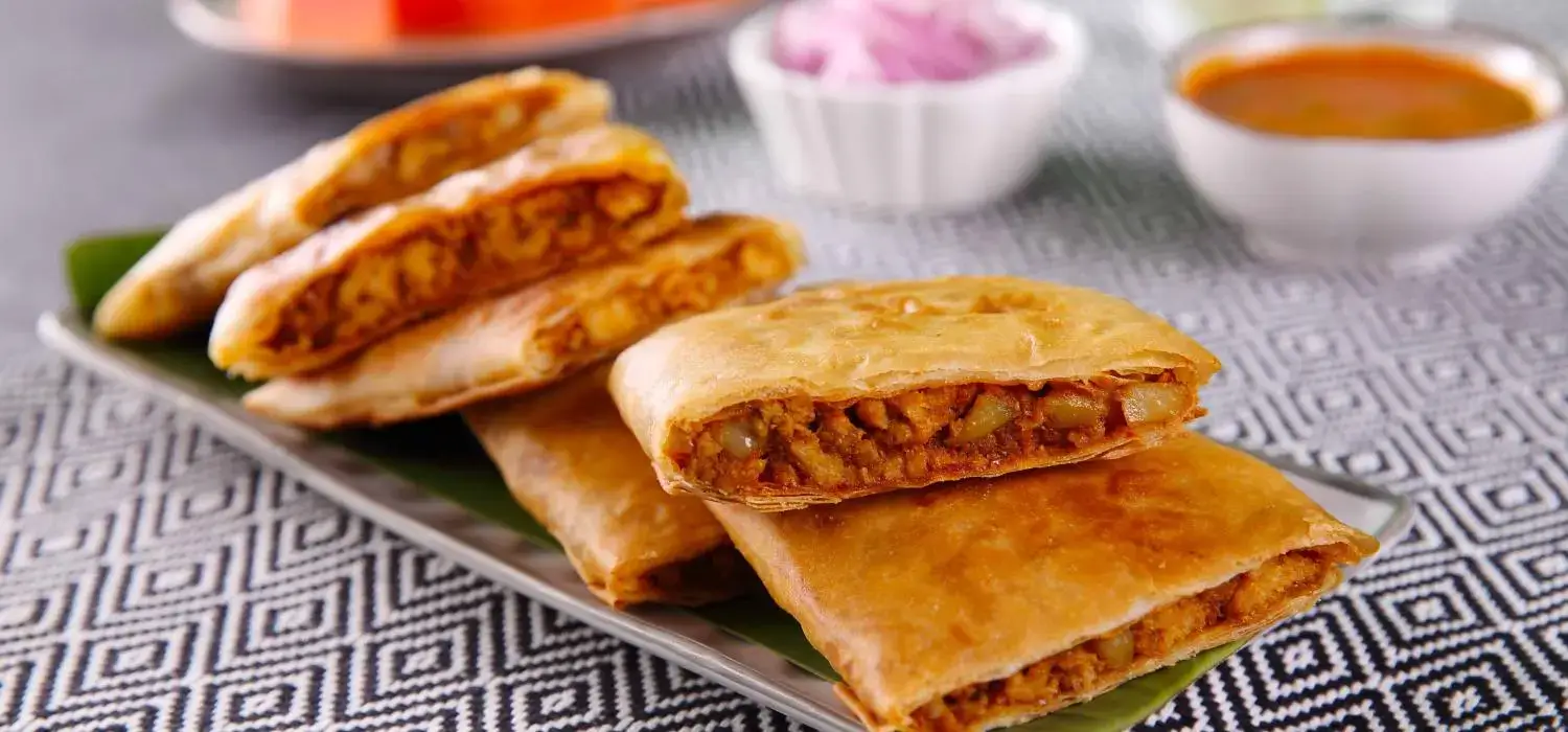 Murtabak, a stuffed pancake or pan-fried bread, demonstrating our variety of options