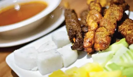 Satay, grilled skewered meat with peanut sauce, showcasing our diverse menu