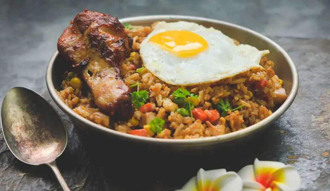 Plate with fried rice, egg, and vegetables